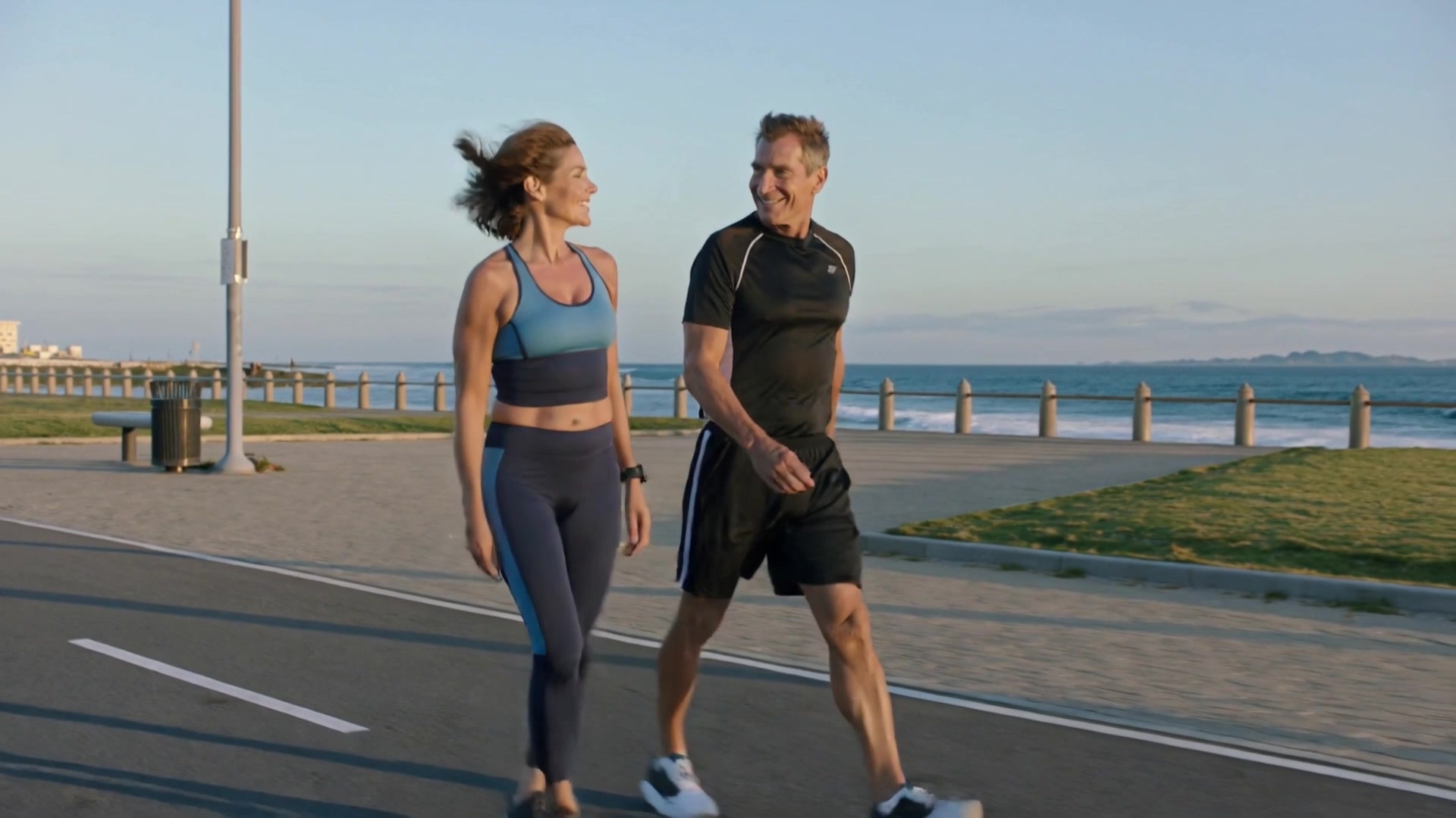 AI-generated lifestyle scene of an adult couple walking by the waterfront